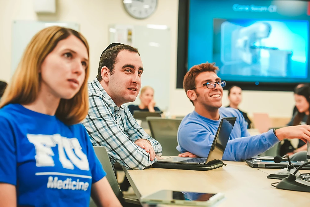 Medical students attend a lecture