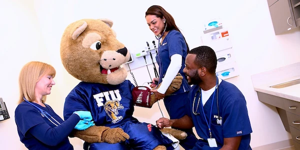 FIU Medicine students examining Roary