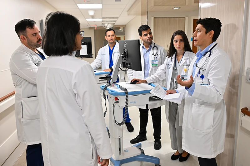 Program Director Dr. Seema Chandra leads internal medicine residents as they begin their first day of training.