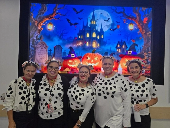 Halloween 2025 employees in costumes